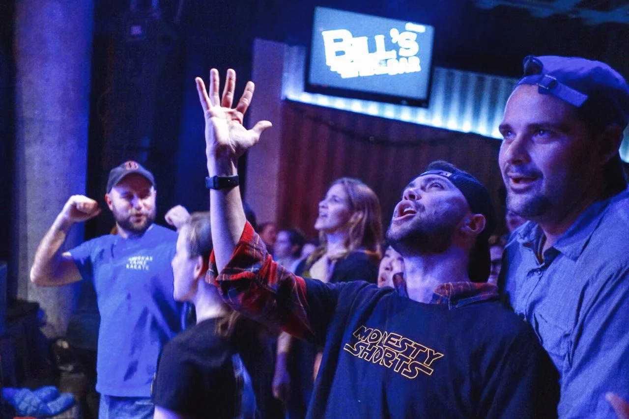 Fans enjoying Modesty Shorts at Bill's Bar, Boston